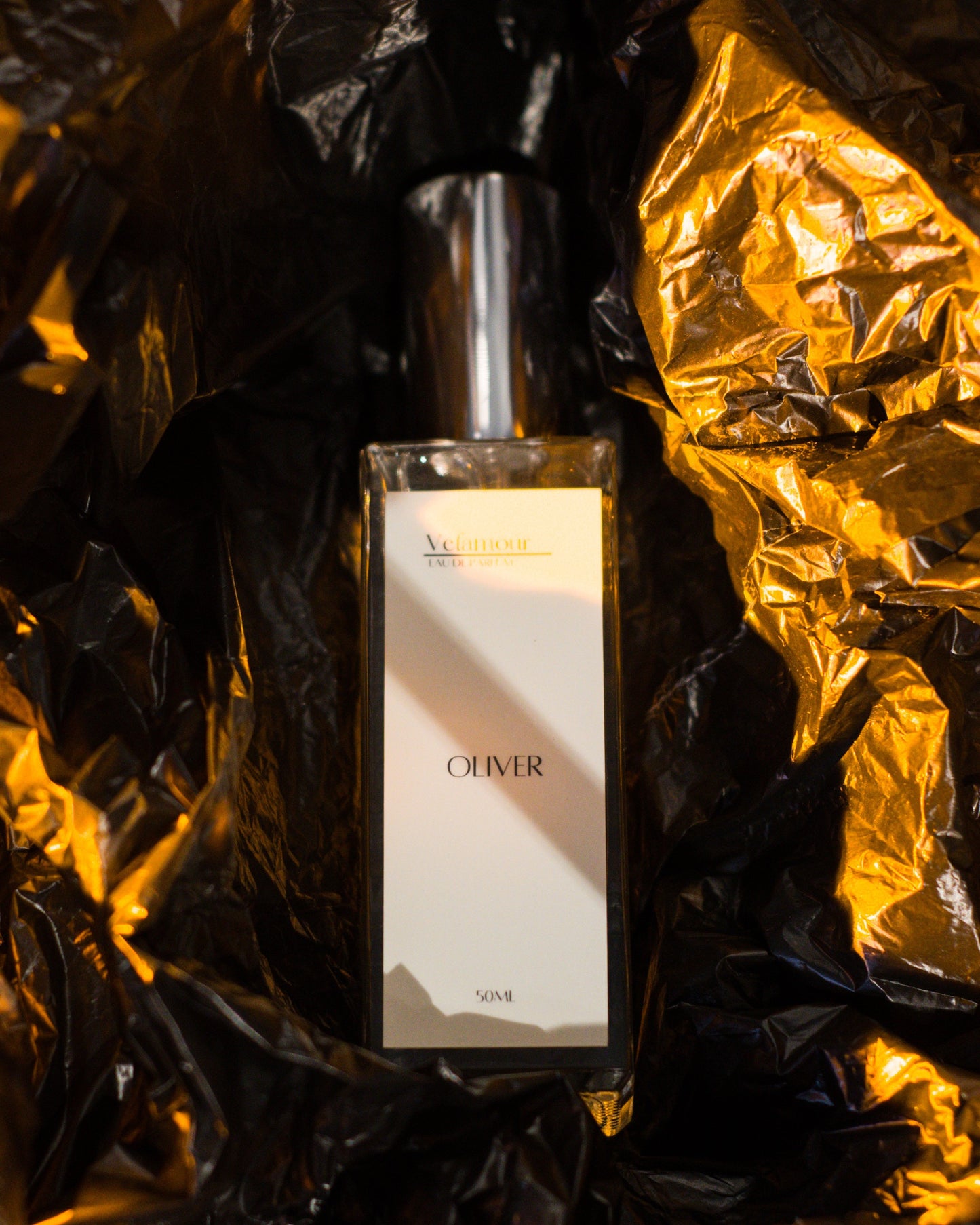 Elegant Glass Perfume Bottle of Oliver, A Fresh Spicy Fragrance