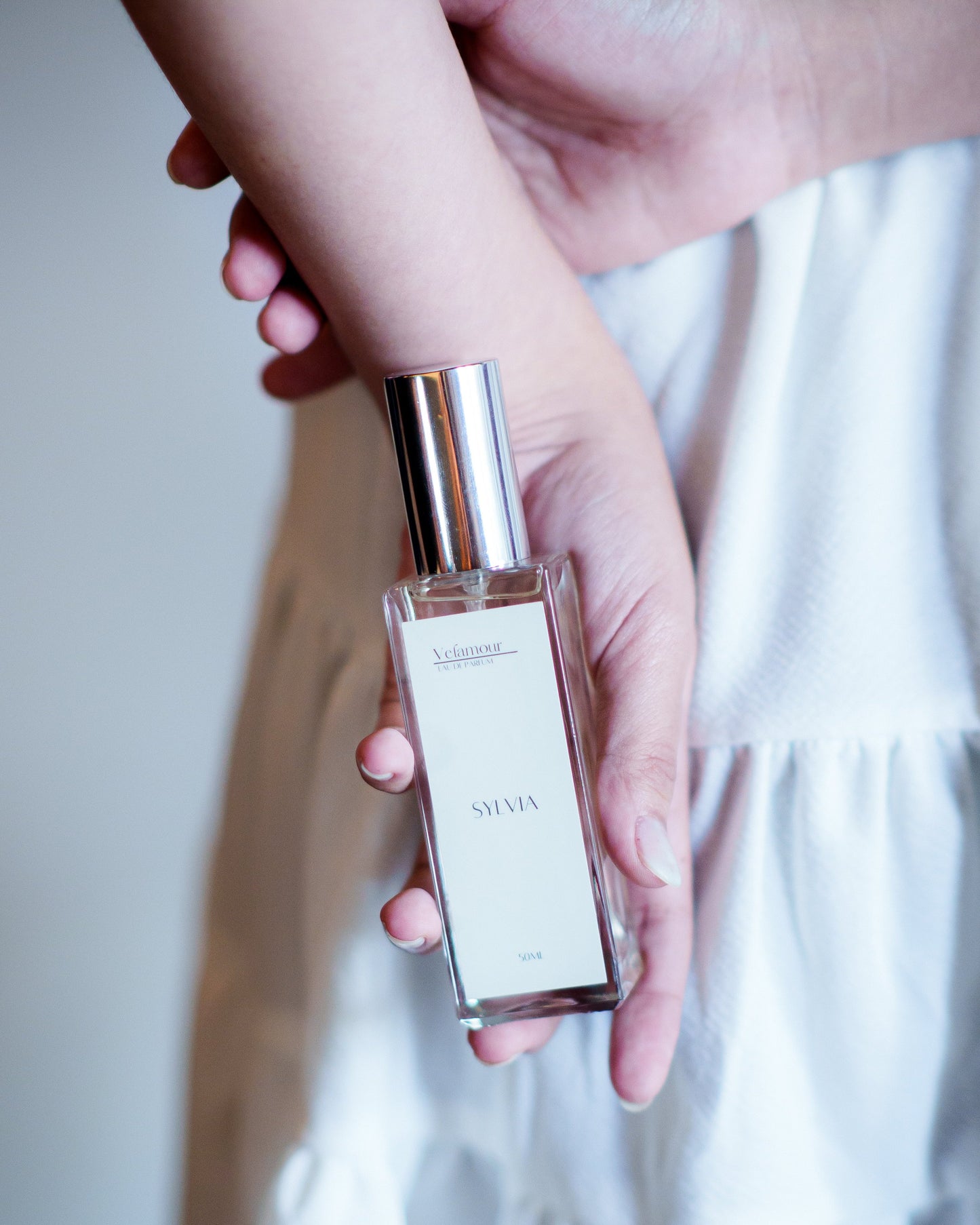 A Woman's Wrist with Sylvia Perfume, Exuding Freshness and Femininity