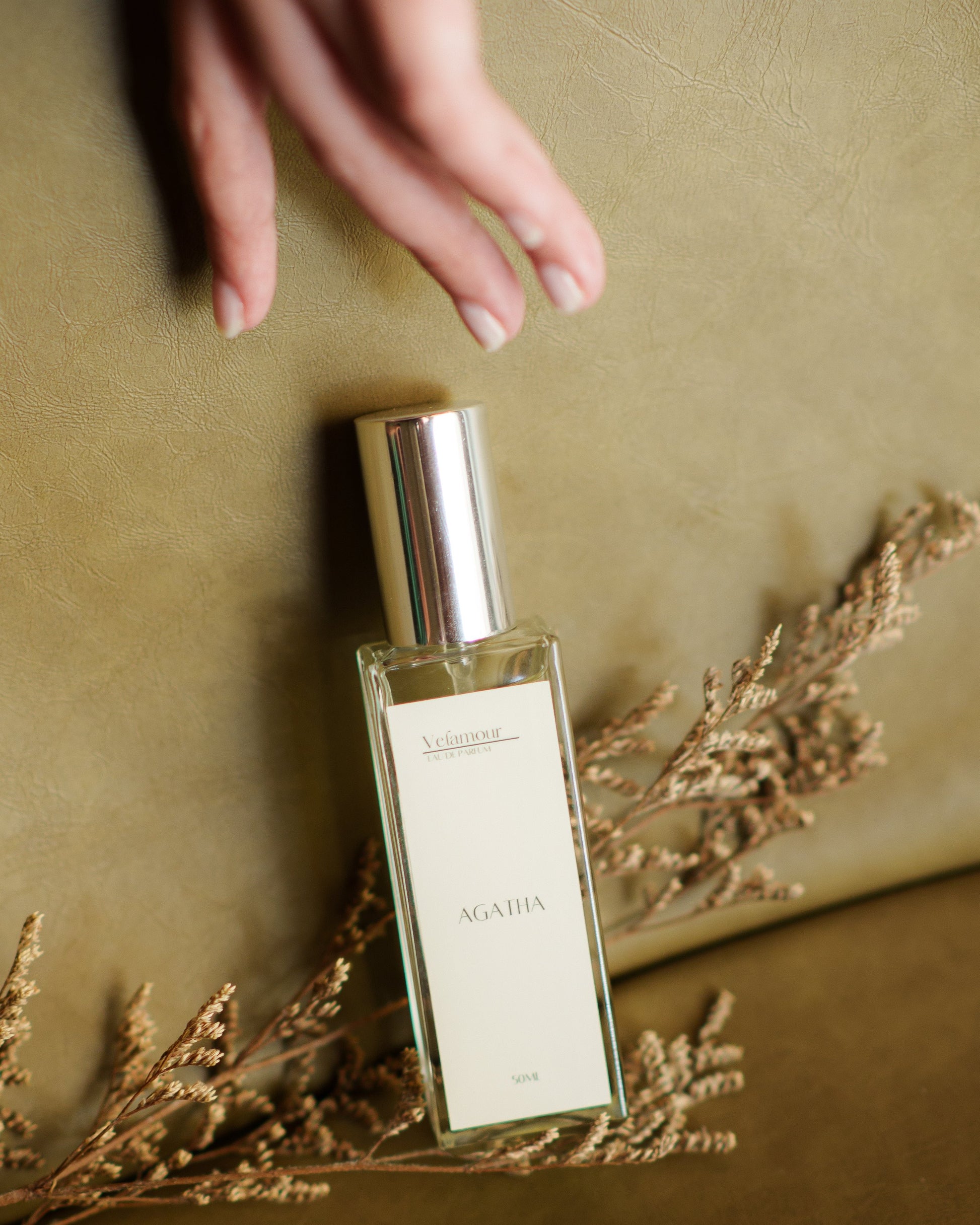 A Woman's hands with Agatha Perfume, Exuding Elegance and Femininity